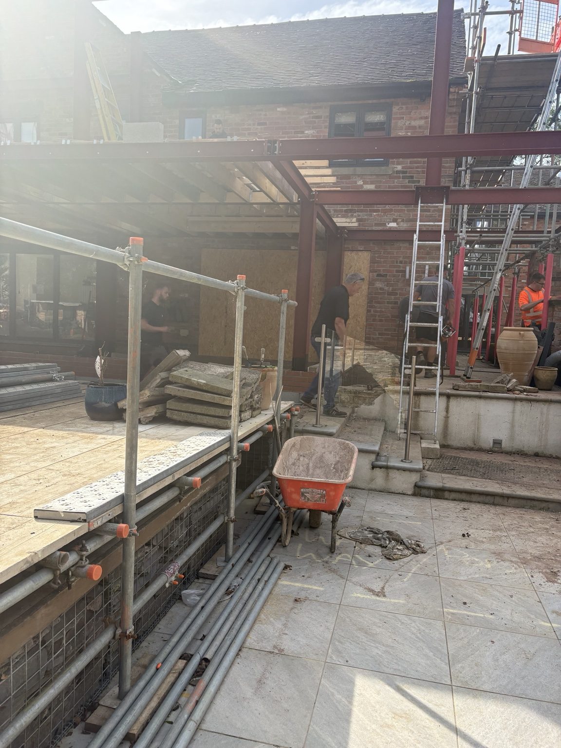 View beneath steelwork and balcony deck during construction