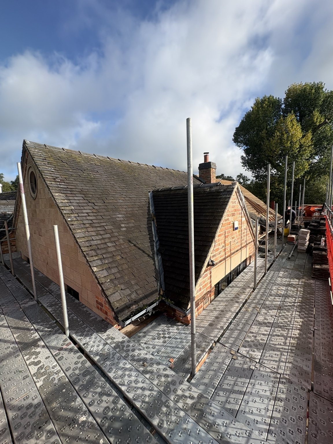 Existing roof slopes and dormer before loft conversion alterations