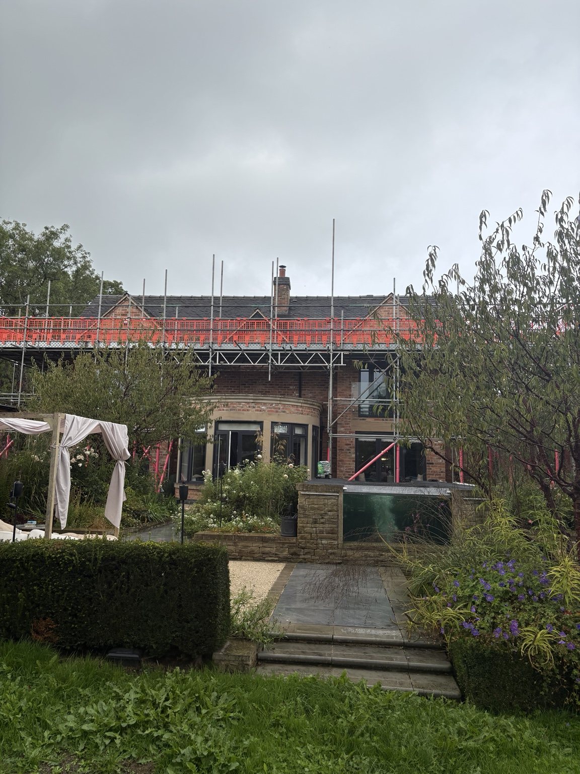 Rear elevation of South View house with scaffold erected